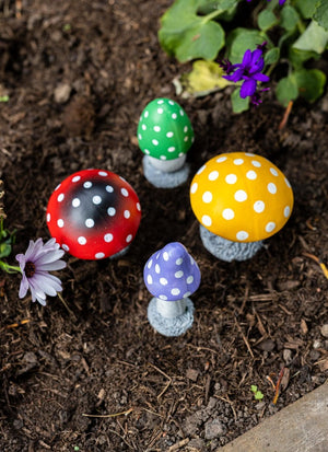 Colourful resin toadstools for flower beds and borders