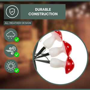 Solar mushroom decorations displayed among outdoor plants