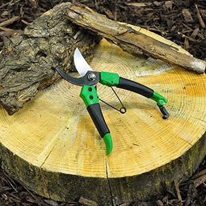 Durable pruning tool with spring loaded cutting action