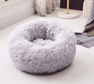 Soft round grey pet bed shown from front