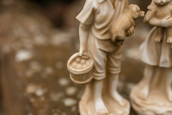 Standing boy resin garden ornament