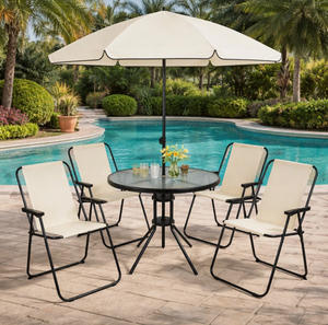 Four folding chairs around round glass table