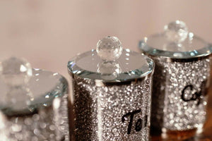 Silver kitchen jars with mirrored lids