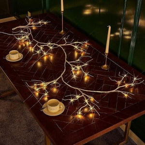 LED twig garland creating a warm decorative glow