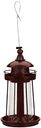 Decorative lighthouse lantern bird feeder hanging outdoors