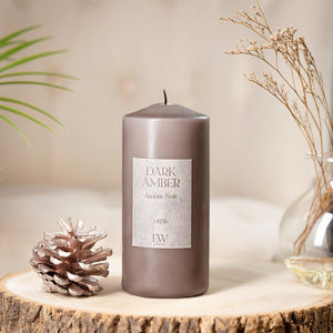 Long burning scented candle in glass container