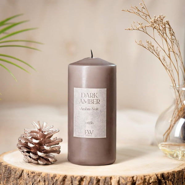 Long burning scented candle in glass container