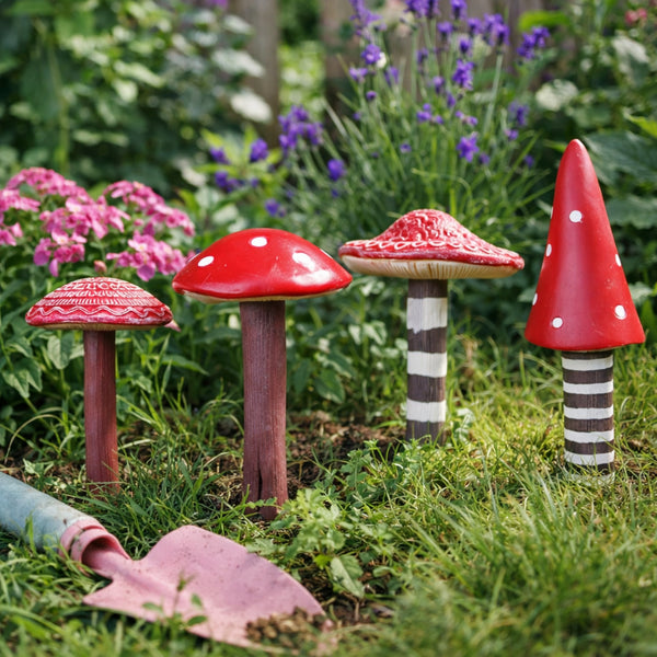 Red toadstool decorations used in a miniature garden