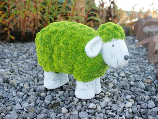 Freestanding resin sheep displayed on patio