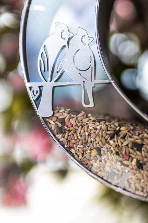 Crescent moon garden feeder shown close up