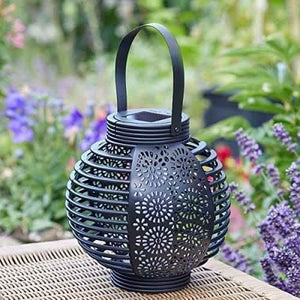 Warm white solar light casting decorative shadows