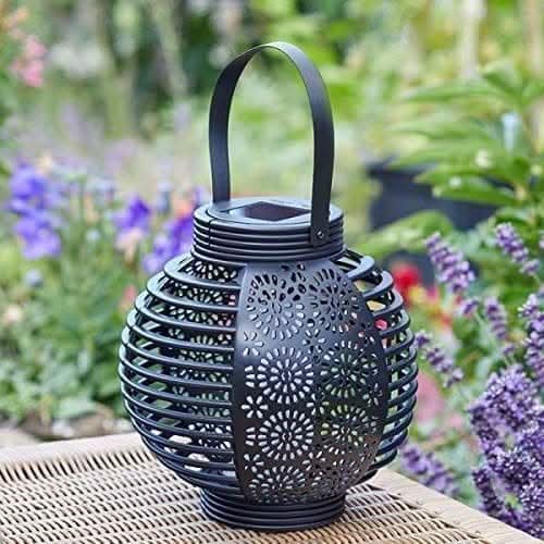 Warm white solar light casting decorative shadows