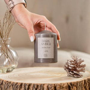 Soy wax candle creating a warm relaxing ambience.