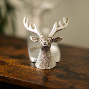 Silver stag candle stand shown from the front