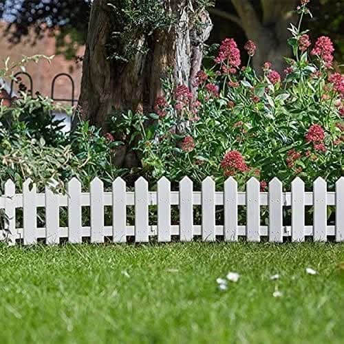 Interlocking plastic garden fence panels shown together