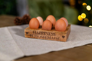 Decorative brown wooden egg holder tray.