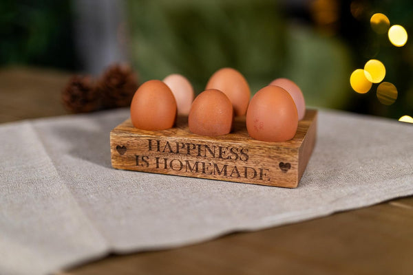 Decorative brown wooden egg holder tray.