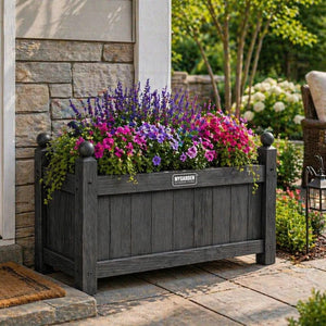 Durable wooden planter enhancing an outdoor garden space.