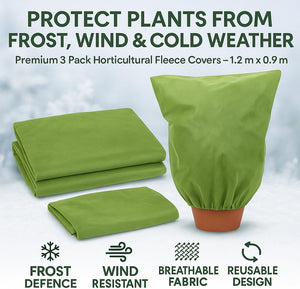 White fleece plant cover shielding shrubs from frost.