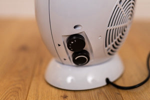 Ceramic electric fireplace heater shown from side