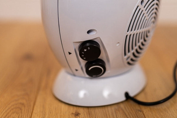 Ceramic electric fireplace heater shown from side