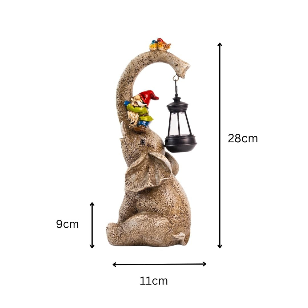 Solar elephant gnome garden ornament with glowing LED lantern