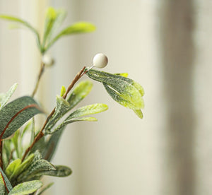 Rustic artificial festive tree with eucalyptus foliage
