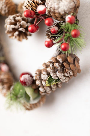 Woodland inspired wreath displayed on a front door