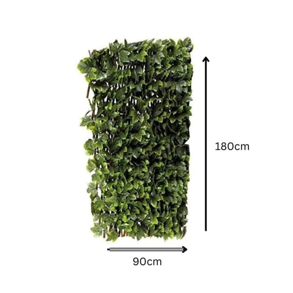 Artificial maple foliage trellis displayed on fence