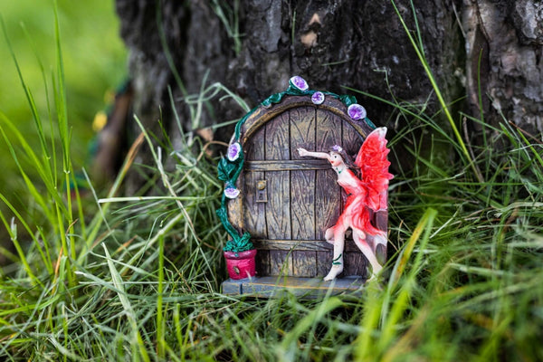 Two 10.5cm fairy doors shown together