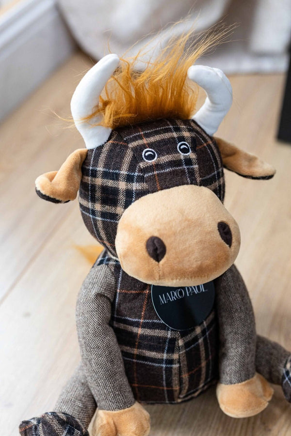 Plush Highland cow doorstop with tartan design
