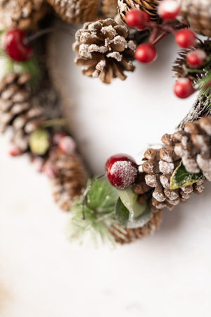 Artificial eucalyptus wreath with pinecone centre