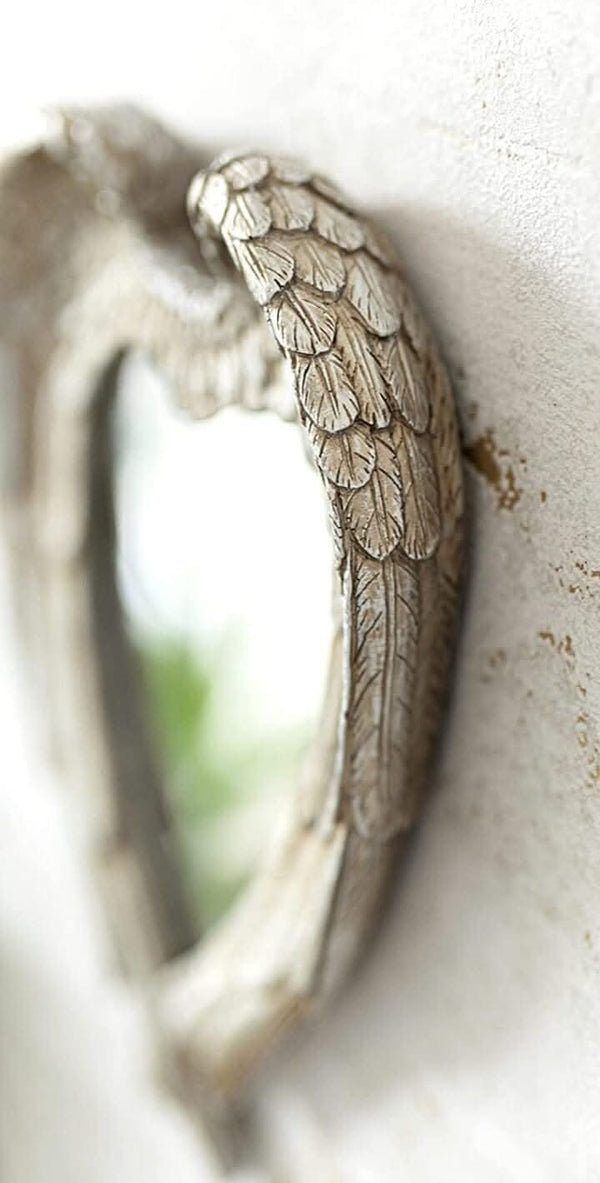 Feathered wings heart mirror shown from front