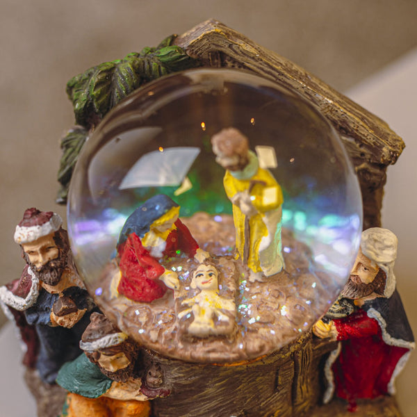 Detailed resin nativity scene with glass globe