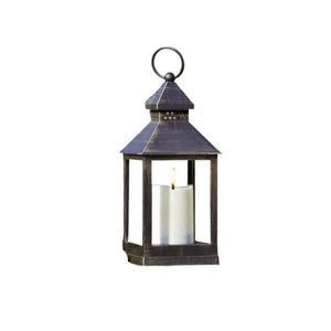 Flameless LED candle lantern displayed indoors