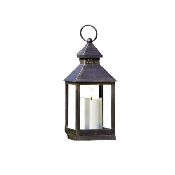 Flameless LED candle lantern displayed indoors