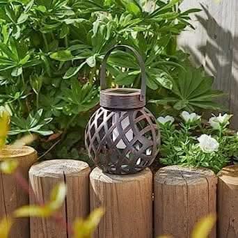 Bronze effect hanging lantern with flickering flame