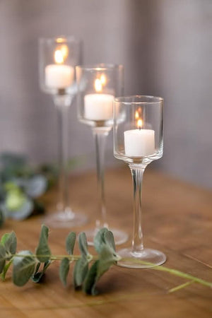 Three glass holders for tealight candles