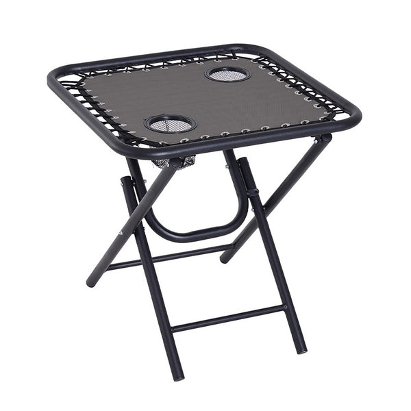 Folding garden chairs arranged for outdoor relaxation