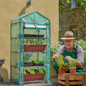 Compact garden greenhouse with powder coated steel frame