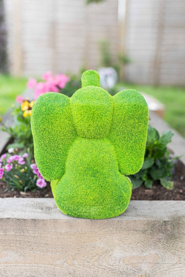 Freestanding elephant garden decoration shown outdoors