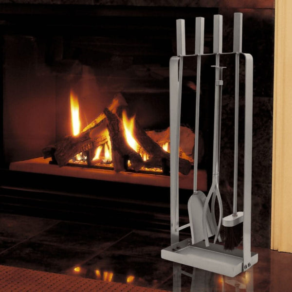 Four piece fireplace accessory set shown indoors