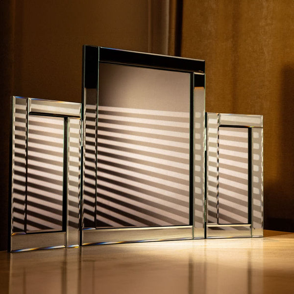 Freestanding vanity mirror with three glass panels