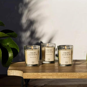 Decorative scented candle in glass container