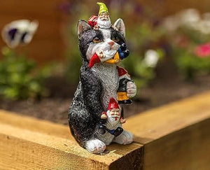 Funny cat eating gnome resin garden ornament