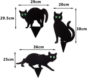 Black cat-shaped decorations with measurements on a white background