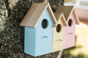 Wooden outdoor bird feeder house