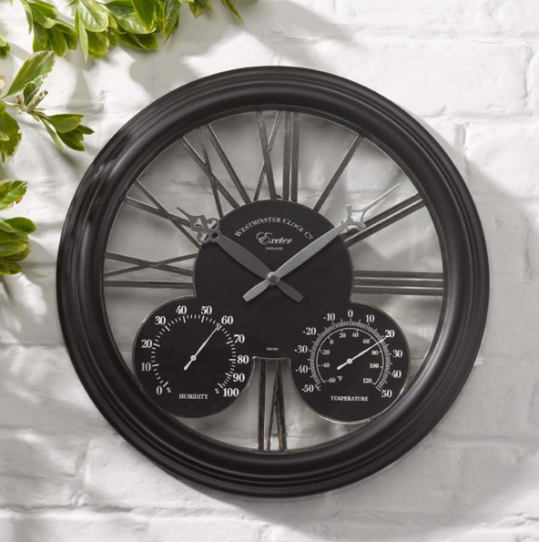 Large black garden clock with thermometer and barometer