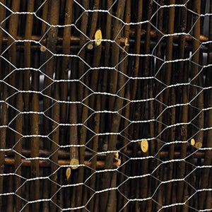 Garden fence mesh for poultry and crop protection.