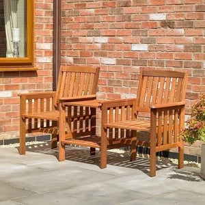 Two seater garden chair with table between the seats